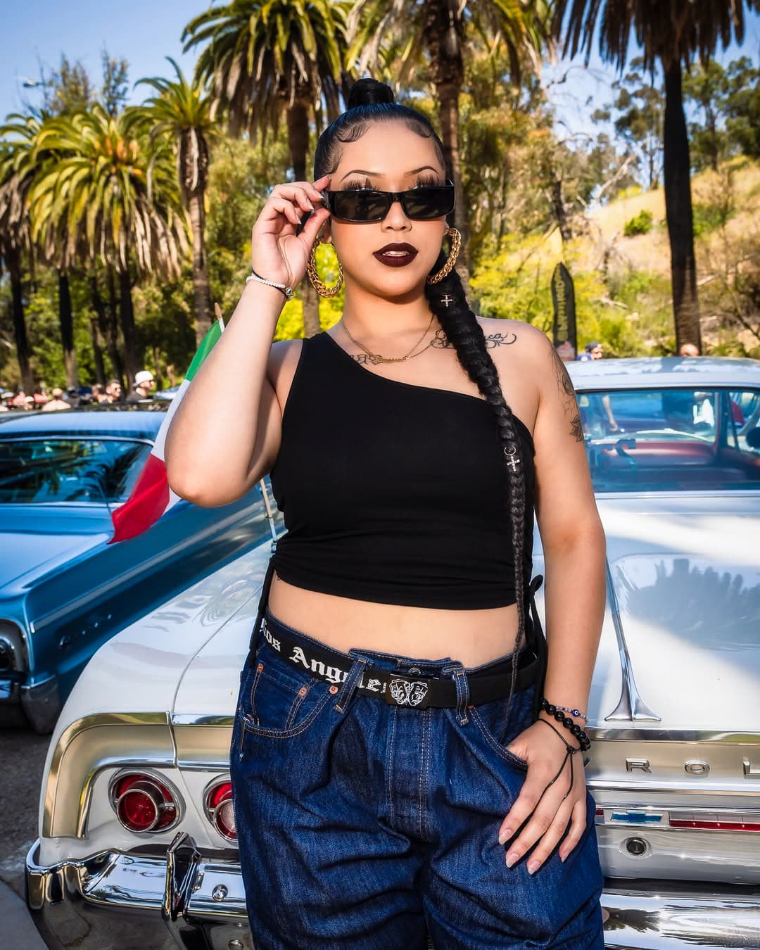 Lowrider night cruise through Las Vegas streets with city lights